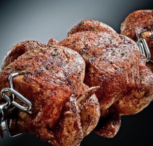 Stock photo of chicken on a rotisserie